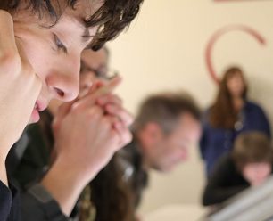 students staring a monitor