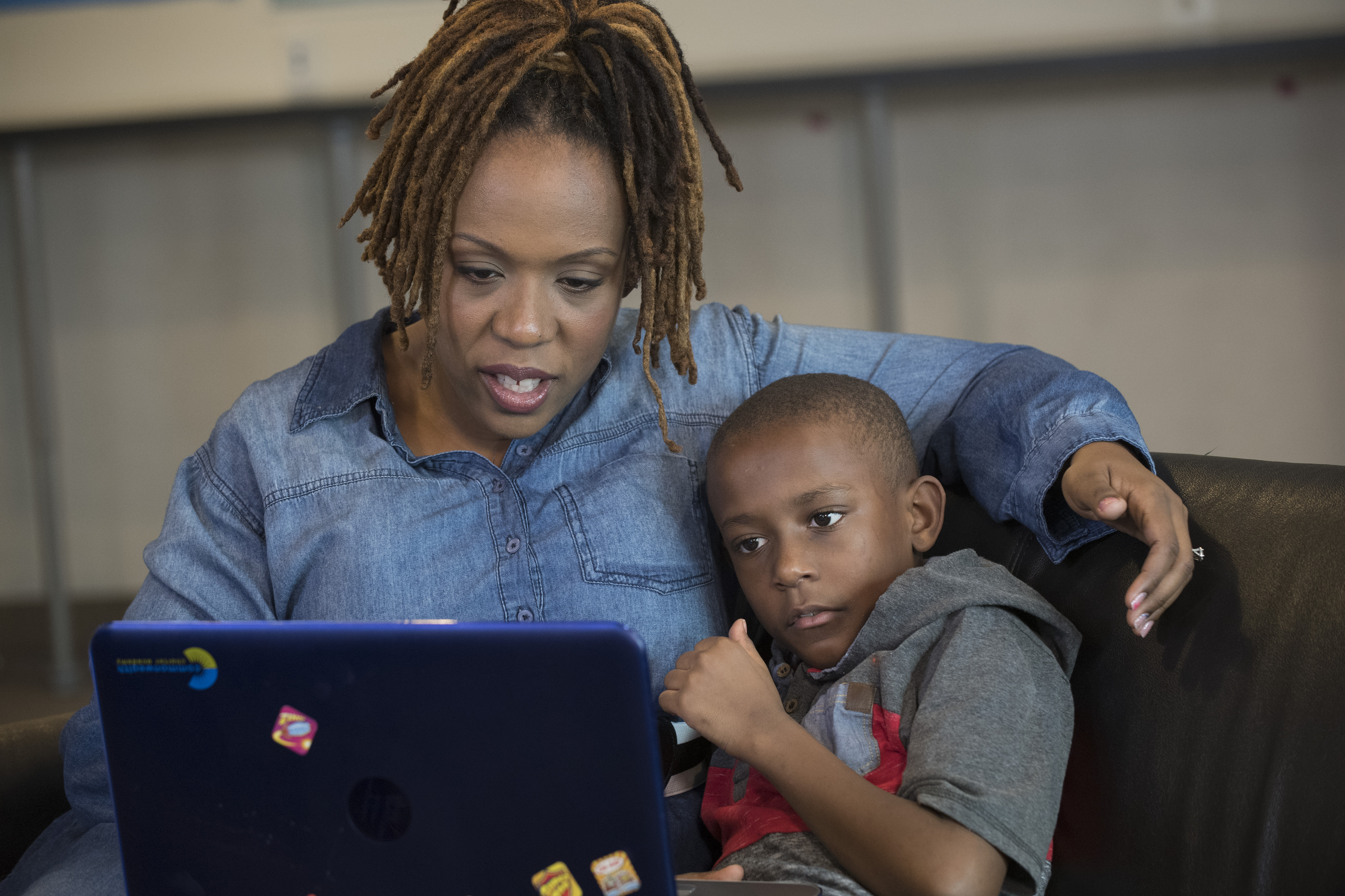 Mother and child using a laptop