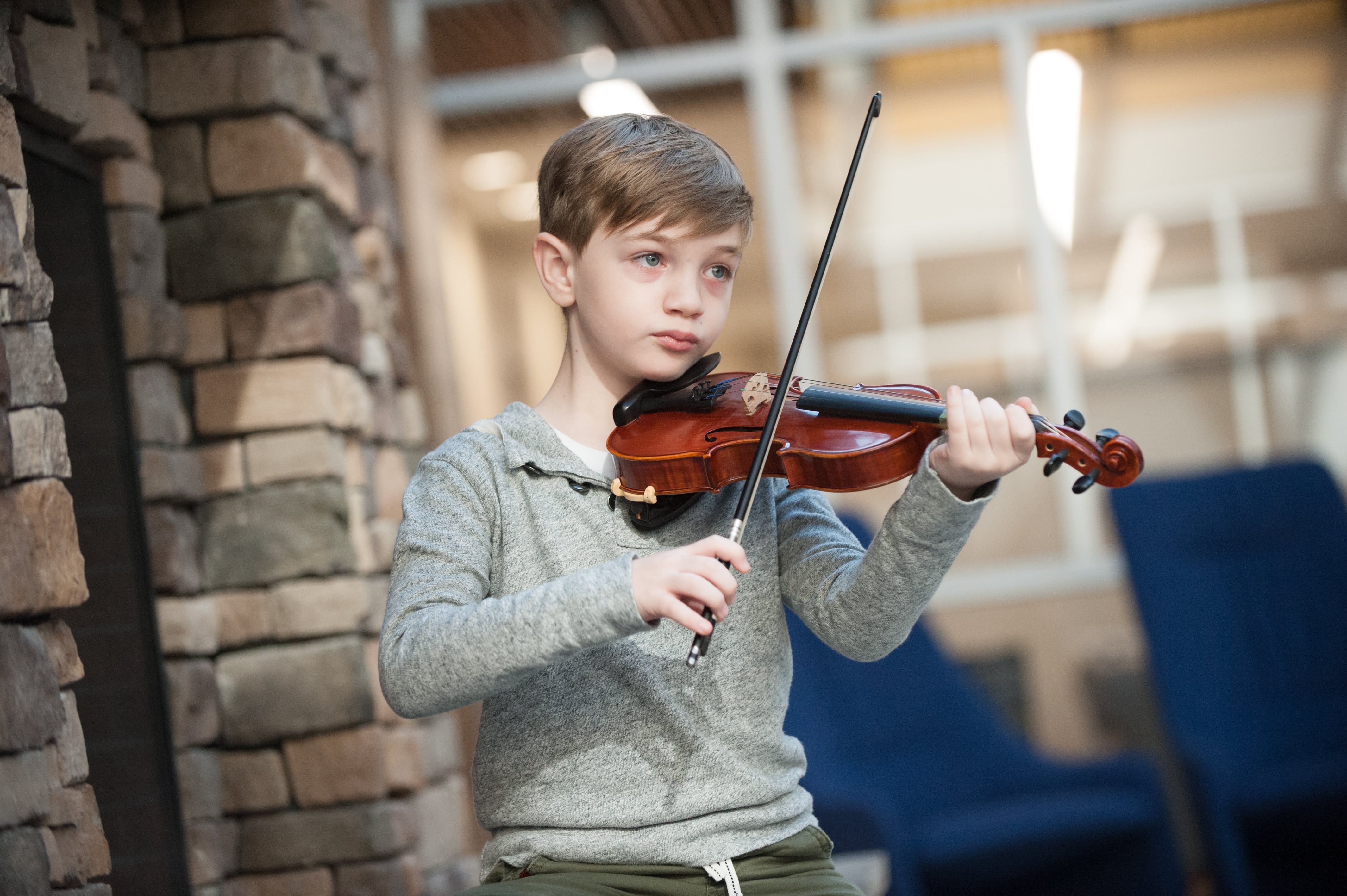 CCA student playing a violin
