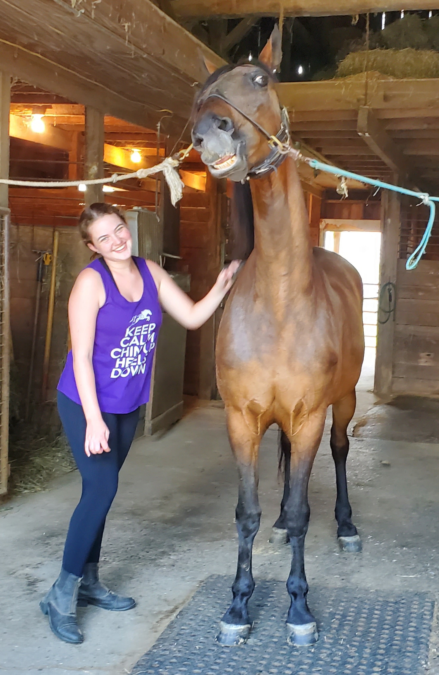 Bella smiling with her horse